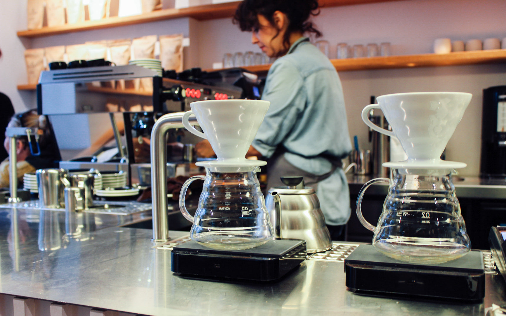 2 pearl scales on a coffee shop setup