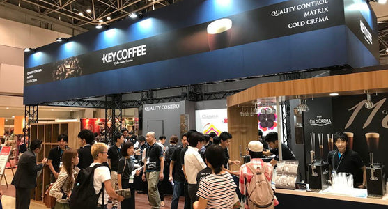 SCAJ 2017 an Image of a large booth at the convention surrounded by conference participants.